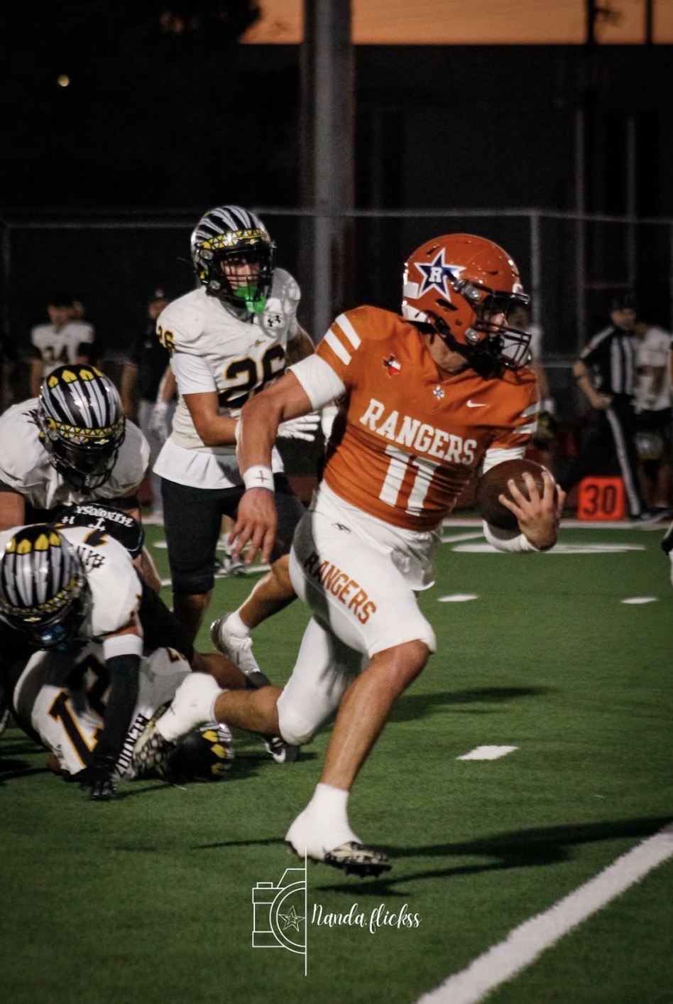 RANGERS ROAR PAST SEMINOLE, 44-34, IN LIGHTNING-DELAYED THRILLER