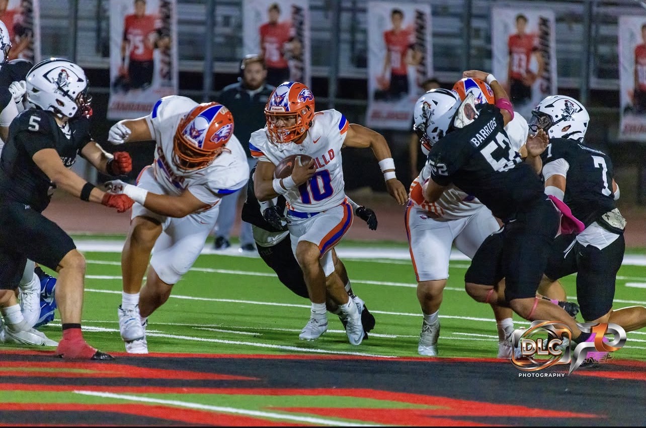 CANUTILLO SURVIVES HANKS IN LIGHTNING-DELAYED THRILLER, 38-35